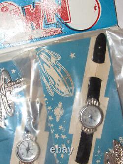 12 VINTAGE 1960s'SPACE NAVIGATOR' TOY WRIST COMPASSES WithBADGE ON STORE DISPLAY