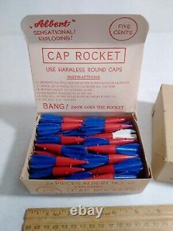 24 Vintage Cap Rocket Ship Space Toys R L Albert & Son store display box 1950s