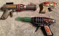 3 Vintage Tin Toy Ray Laser Guns Mars Atomic And Space Jet Guns