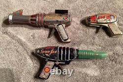 3 Vintage Tin Toy Ray Laser Guns Mars Atomic And Space Jet Guns