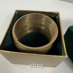 Limited Edition Vintage Brass Slinky in Frederick & Nelson Green Felt withGold box