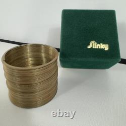 Limited Edition Vintage Brass Slinky in Frederick & Nelson Green Felt withGold box