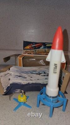 Rare Vintage 7 Apollo Rocket Moon Trek Motorized Flying Rocket toy, Hong Kong