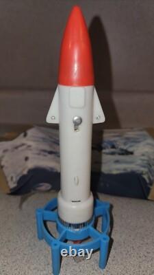 Rare Vintage 7 Apollo Rocket Moon Trek Motorized Flying Rocket toy, Hong Kong