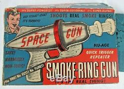VINTAGE NU AGE SMOKE RING SPACE GUN IN BOX with 2 PACKS OF SMOKE PELLETS & STRIKE