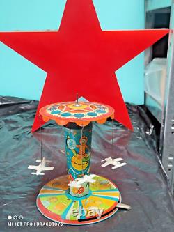 VINTAGE SPACE JET CAROUSEL WIND UP CLOCKWORK TOY 1960's AGATEX ROMANIA LEI WORKS