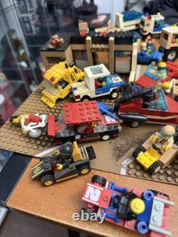 Vintage 1980's Lego Mini Figs and big lot Legos Vehicles NASA Police etc