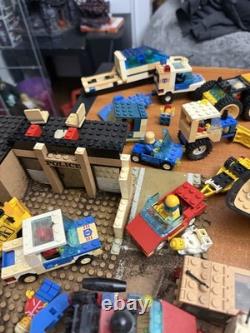 Vintage 1980's Lego Mini Figs and big lot Legos Vehicles NASA Police etc