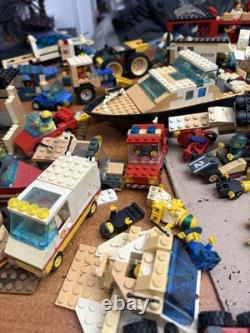 Vintage 1980's Lego Mini Figs and big lot Legos Vehicles NASA Police etc