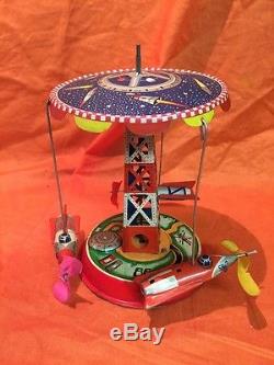 Vintage Japan Space Rocket Tin Space Station Carousel Wind-up. Rare Toy