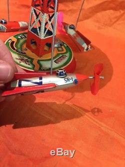 Vintage Japan Space Rocket Tin Space Station Carousel Wind-up. Rare Toy