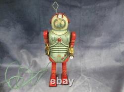 Vintage Nomura Space Man battery operated remote control tin walker toy BO space