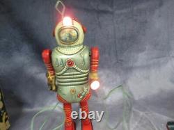 Vintage Nomura Space Man battery operated remote control tin walker toy BO space