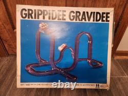 Vintage TOMY Grippidee Gravidee 603 plastic Double Rocket motorized car COMPLETE