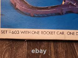 Vintage TOMY Grippidee Gravidee 603 plastic Double Rocket motorized car COMPLETE
