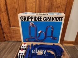 Vintage TOMY Grippidee Gravidee 603 plastic Double Rocket motorized car COMPLETE