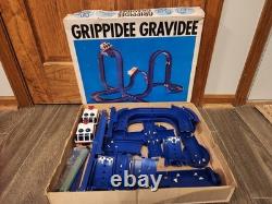 Vintage TOMY Grippidee Gravidee 603 plastic Double Rocket motorized car COMPLETE