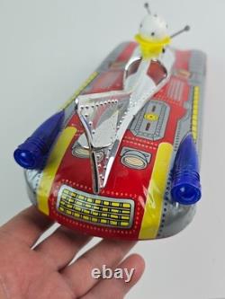 Vintage Tin Litho Space Car Battery operated with floating ball bump'n go Working