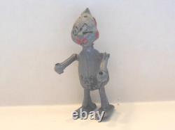 Vintage metal robot figure. Manual walking. 2-1/2 tall. Very Unusual