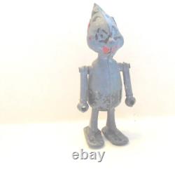 Vintage metal robot figure. Manual walking. 2-1/2 tall. Very Unusual