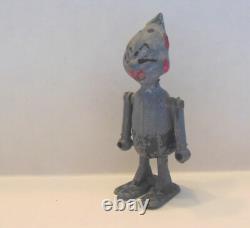 Vintage metal robot figure. Manual walking. 2-1/2 tall. Very Unusual
