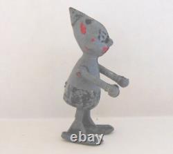 Vintage metal robot figure. Manual walking. 2-1/2 tall. Very Unusual