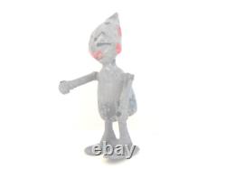 Vintage metal robot figure. Manual walking. 2-1/2 tall. Very Unusual