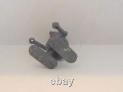 Vintage metal robot figure. Manual walking. 2-1/2 tall. Very Unusual