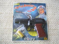 Vintage space flying saucer toy disc shooter