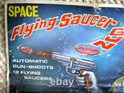 Vintage space flying saucer toy disc shooter