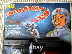 Vintage space flying saucer toy disc shooter